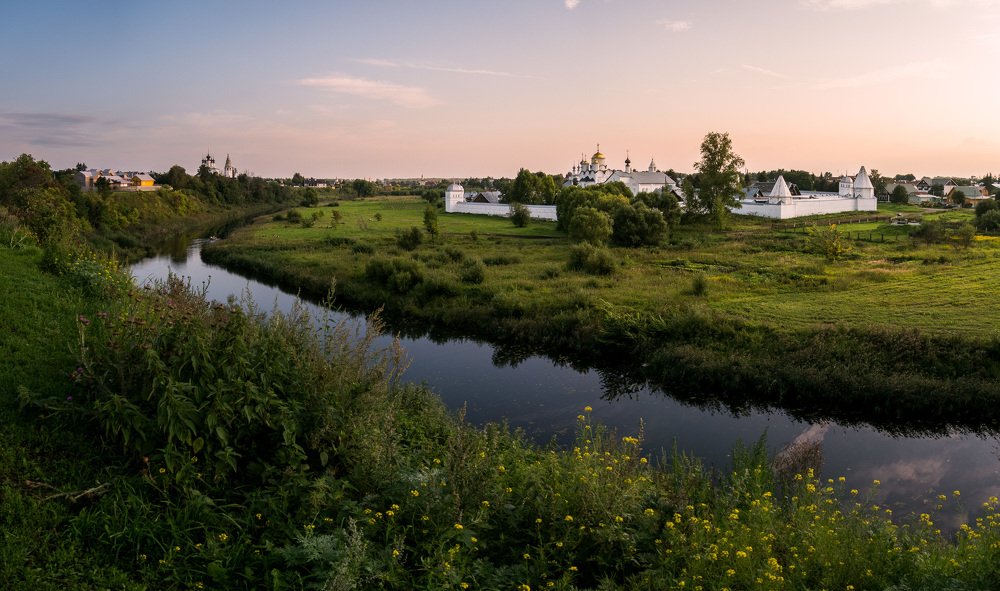 Panoramic shot of Suzdal over Kamenka river