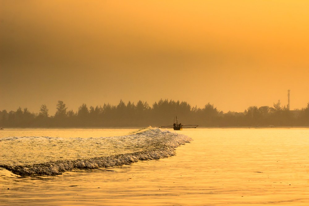cruise on a sunny morning with calm waves in the Indian ocean