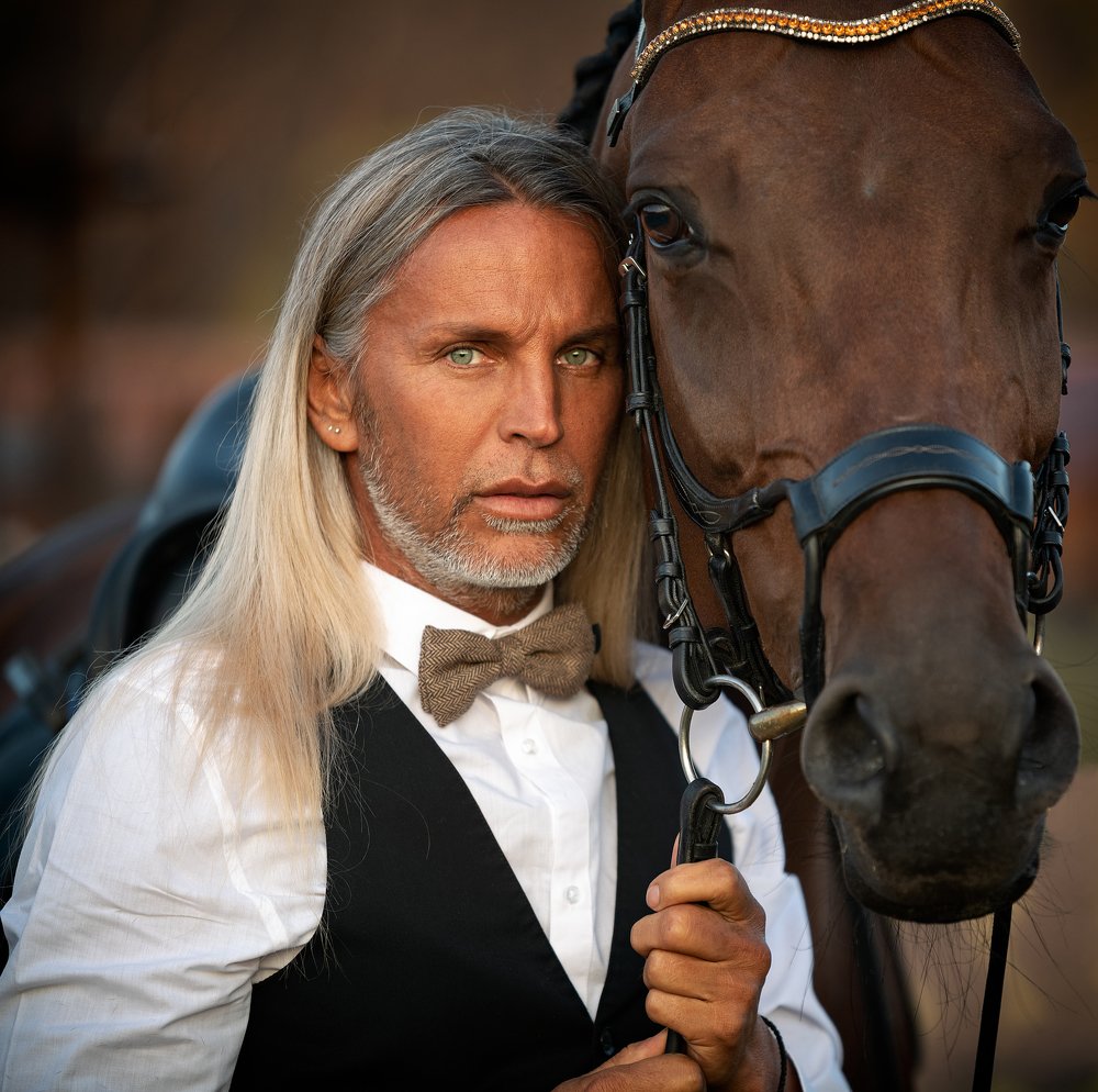 Portrait of a man with a horse
