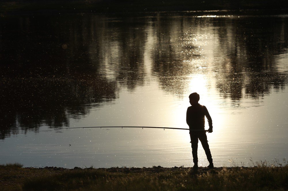 Мальчик - рыбак