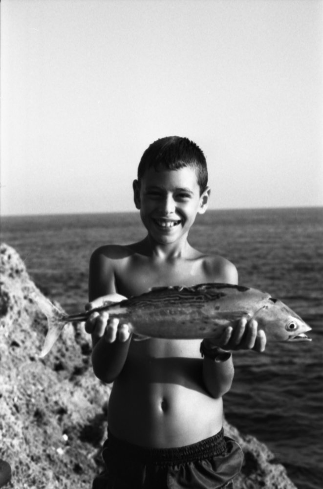 The Boy With The Fish