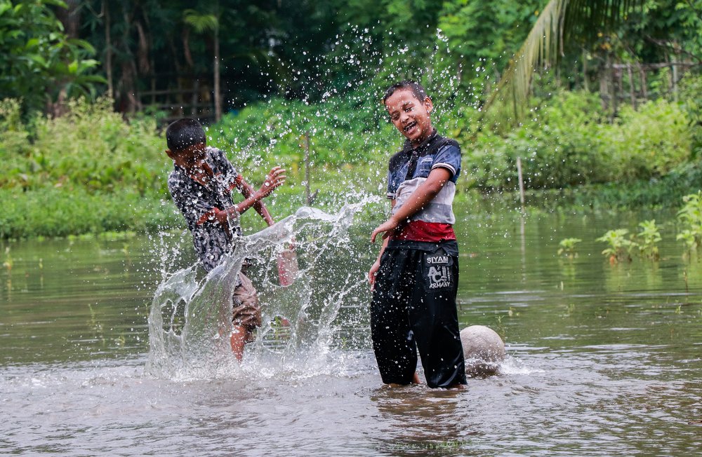 playing into the water .