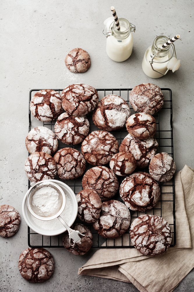 Chocolate brownie cookies in powdered sugar.