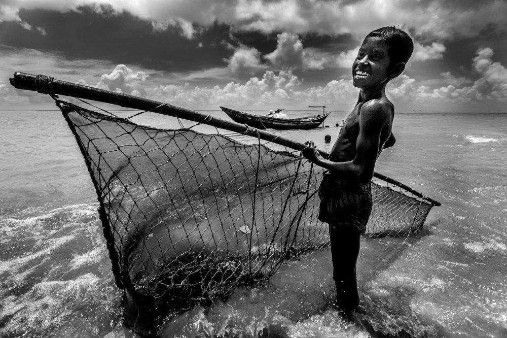 Amir hossen 10 year, A shrimp larvae (fry) Collector.