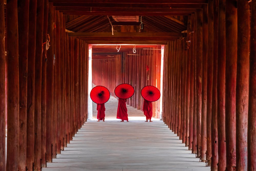 Novices Monk Walking In Old Temple