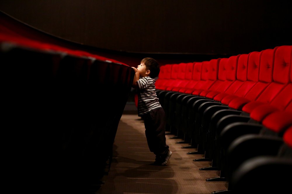 kid in theater hall