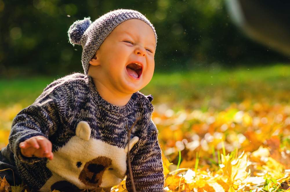 Happiness in autumn leaves