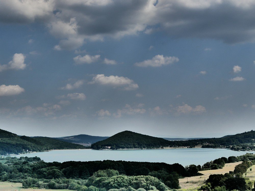Beautiful water dam. Above which rises the sun.