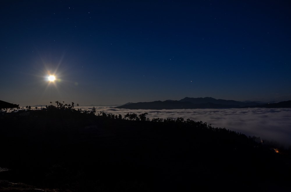 Full moon above the cloud