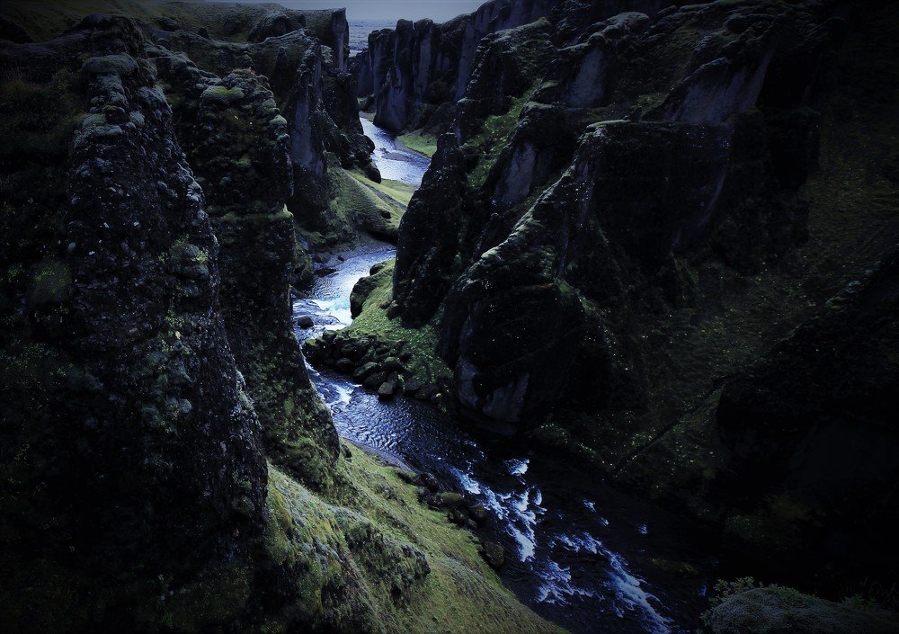 Moonlight flow between the magic  cliffs in Iceland