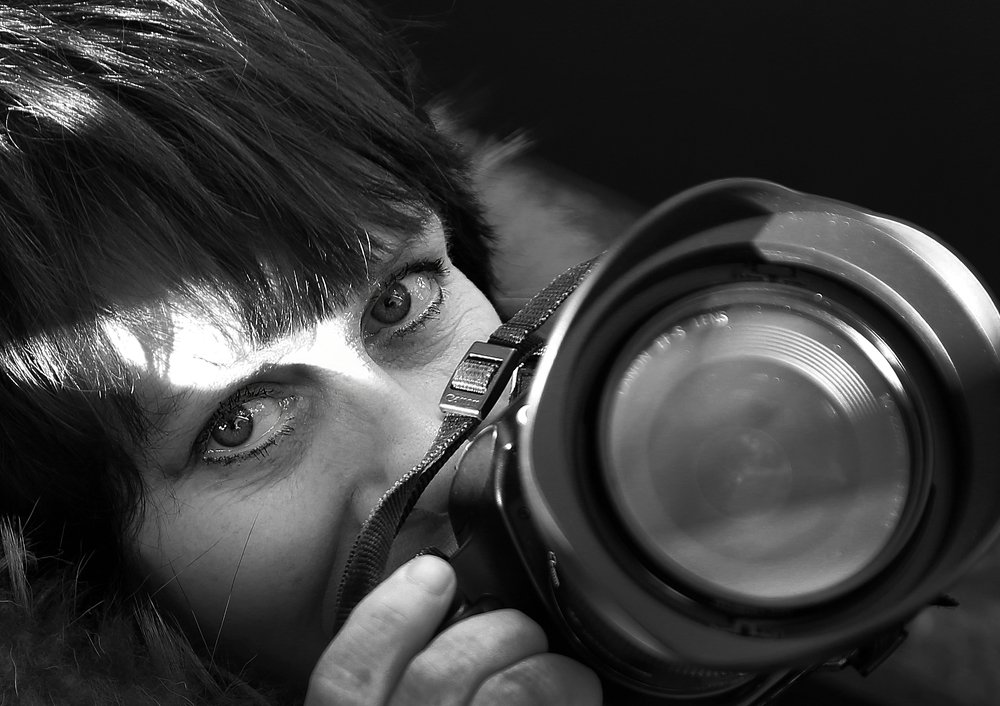 Девушка-фотограф.