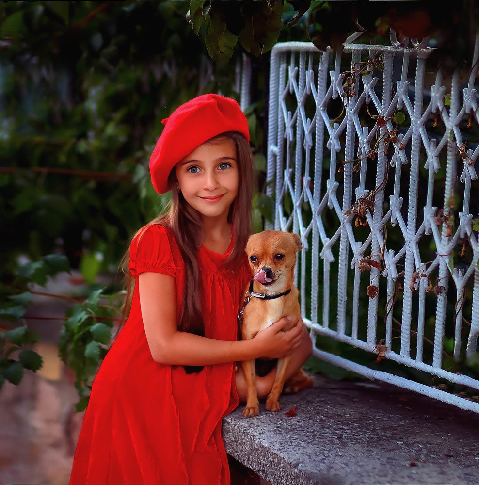 lady in red with her puppy