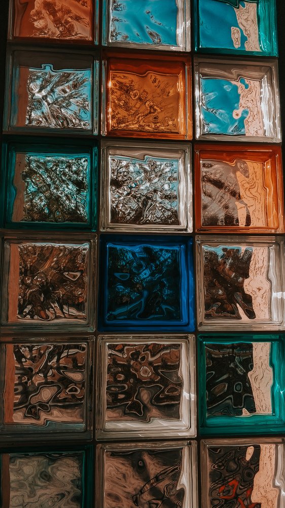 Multi-colored glass.  Stained glass window.