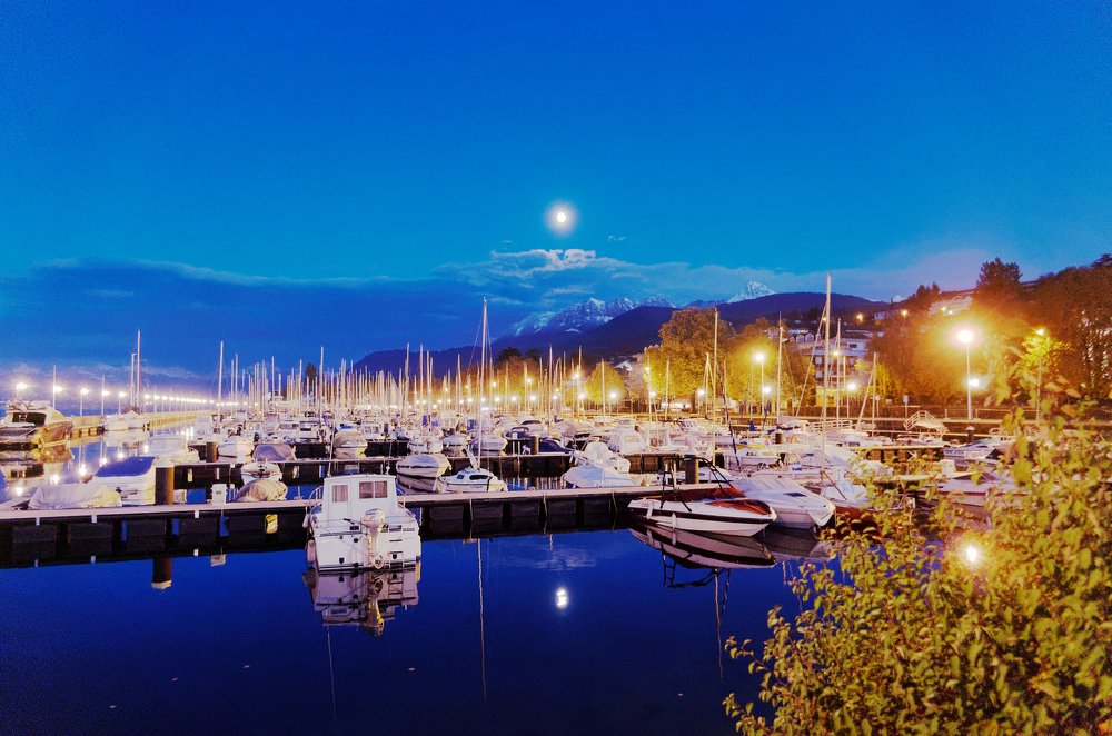 Twilight and moon on Evian harbour