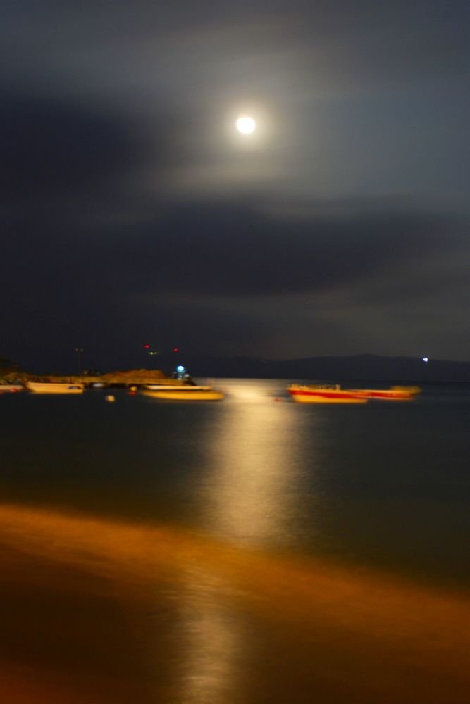 sea, moon and behind