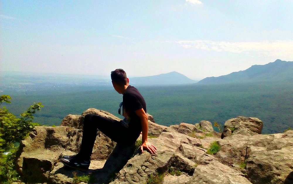 at the peak of the mountain