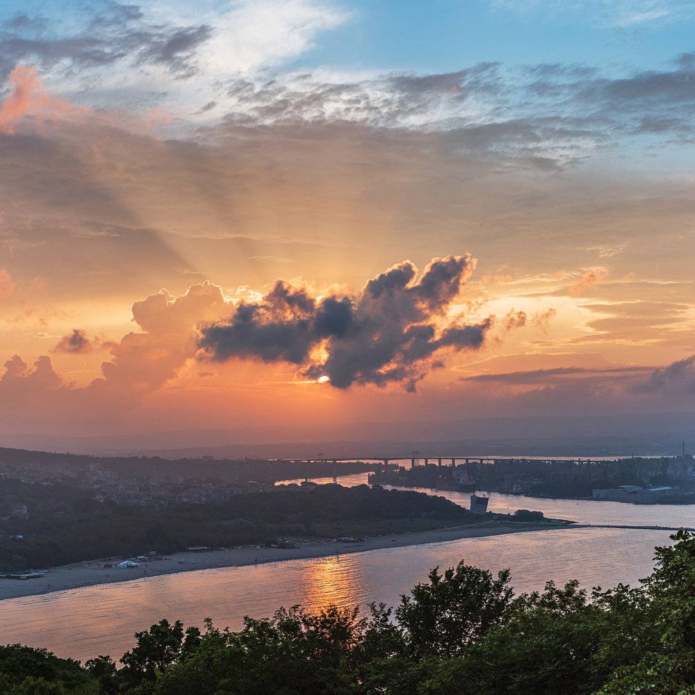 Sea city sunset scape