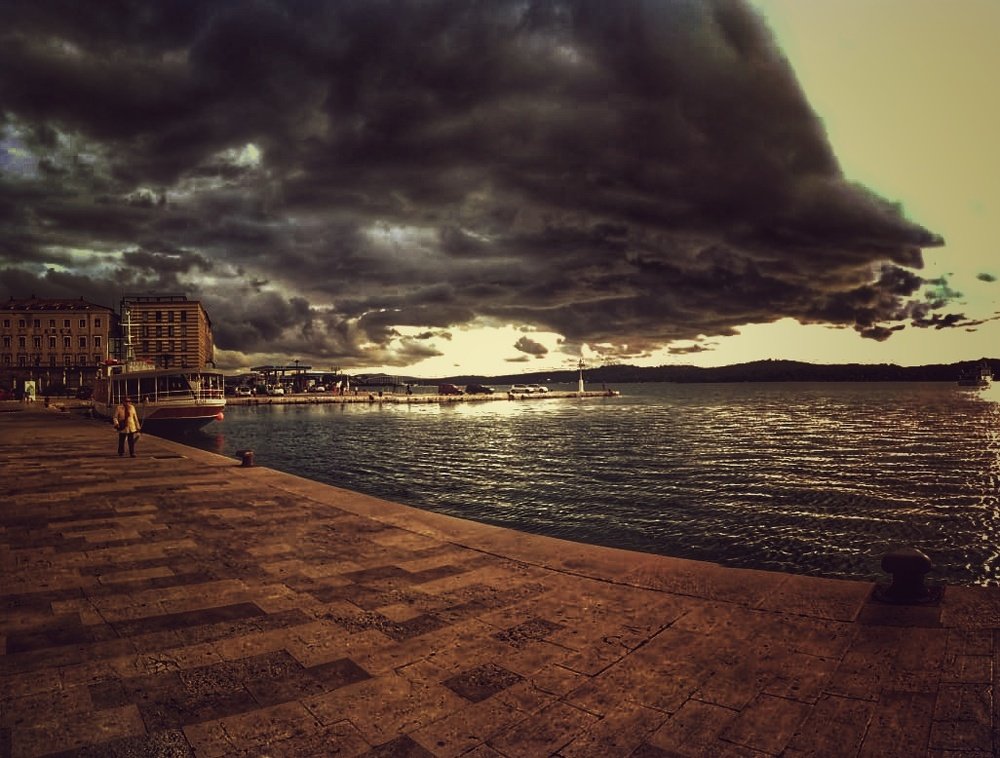 Panoramoc view on dark stormy clouds