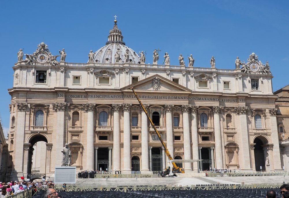 Vatican city. Rome Italy.Tourists walking in the exterior of the Vatican. Vatican exterior.