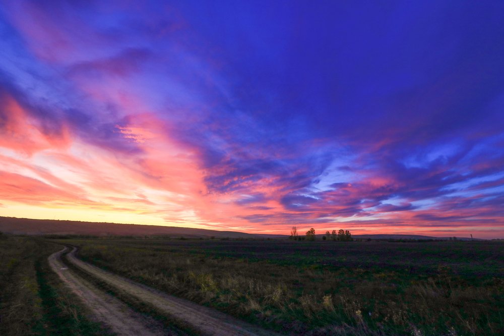 Country road at sunset time