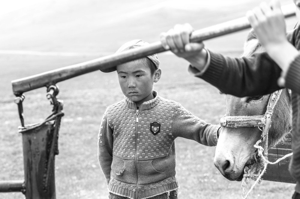 Boy and water, Kyrgyzstan 2019