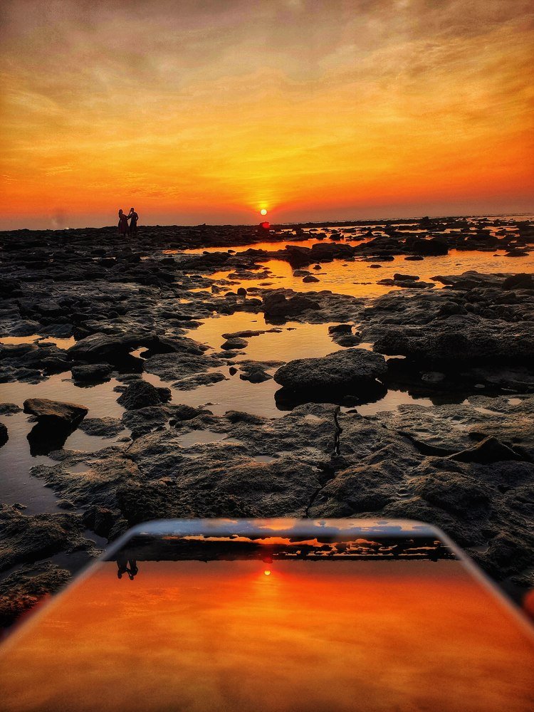 Sunset symmetry photo with two couples