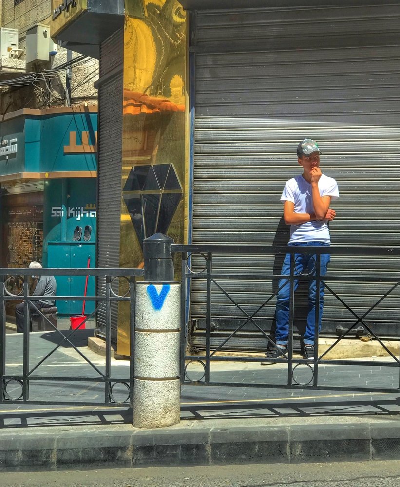 Man in street , thinking in something