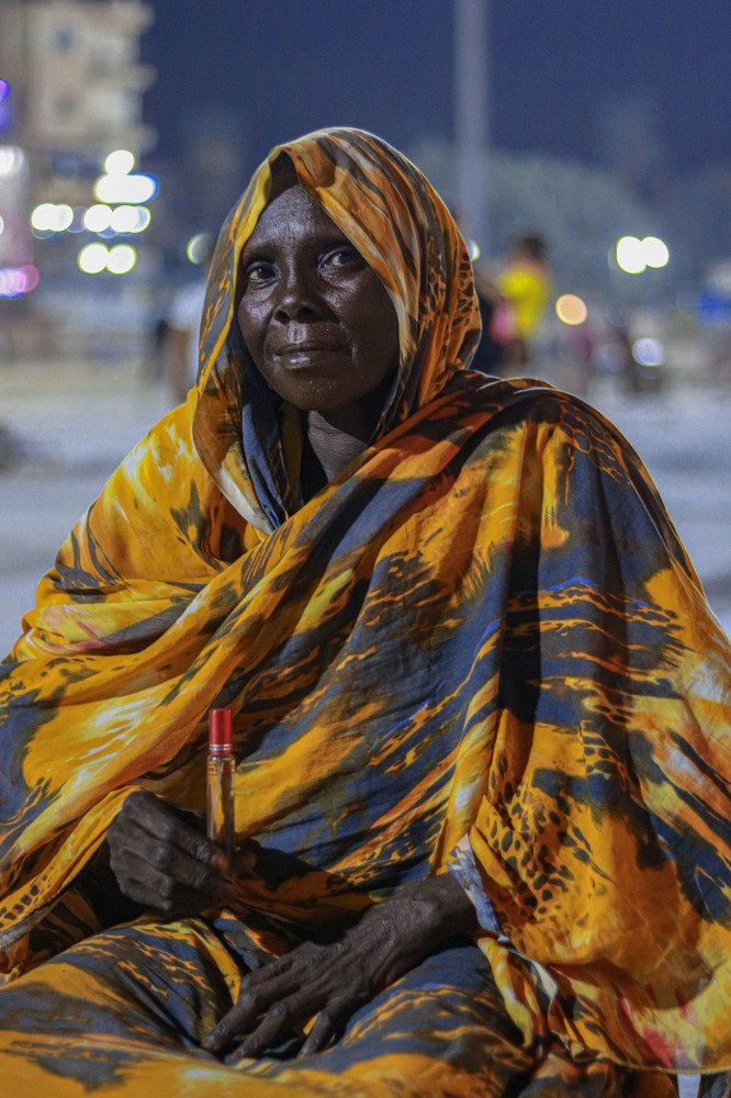 A lady selling perfume