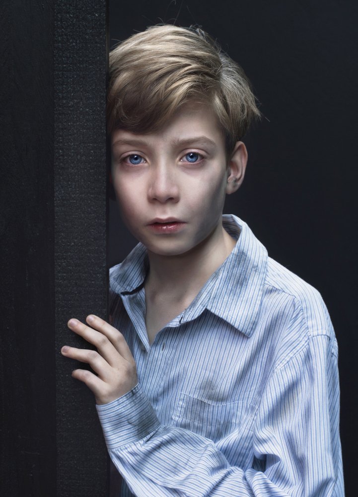 The boy with the striped pyama