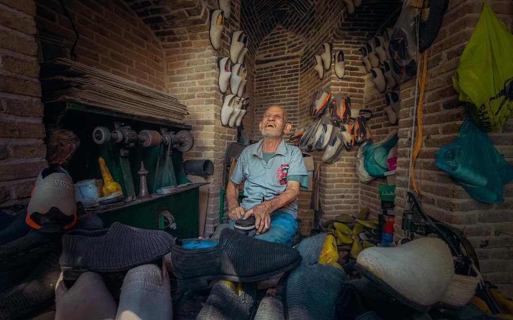 Smiling shoemaker