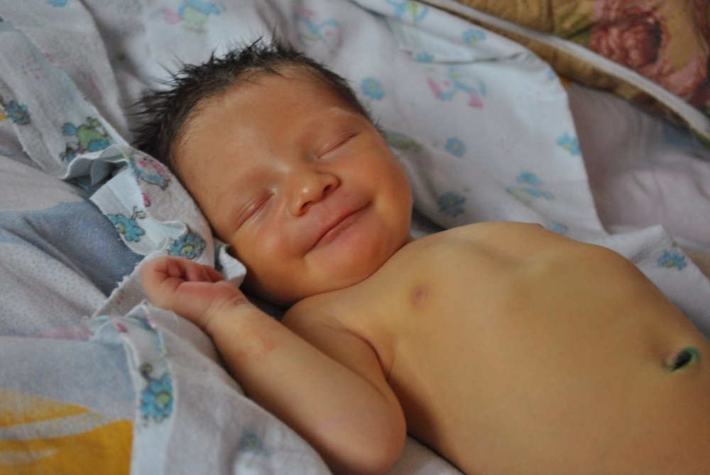 Первая улыбка.