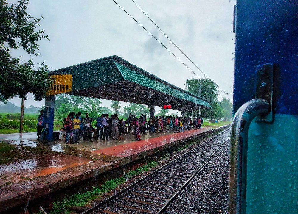 BUSY STATION IN RAIN