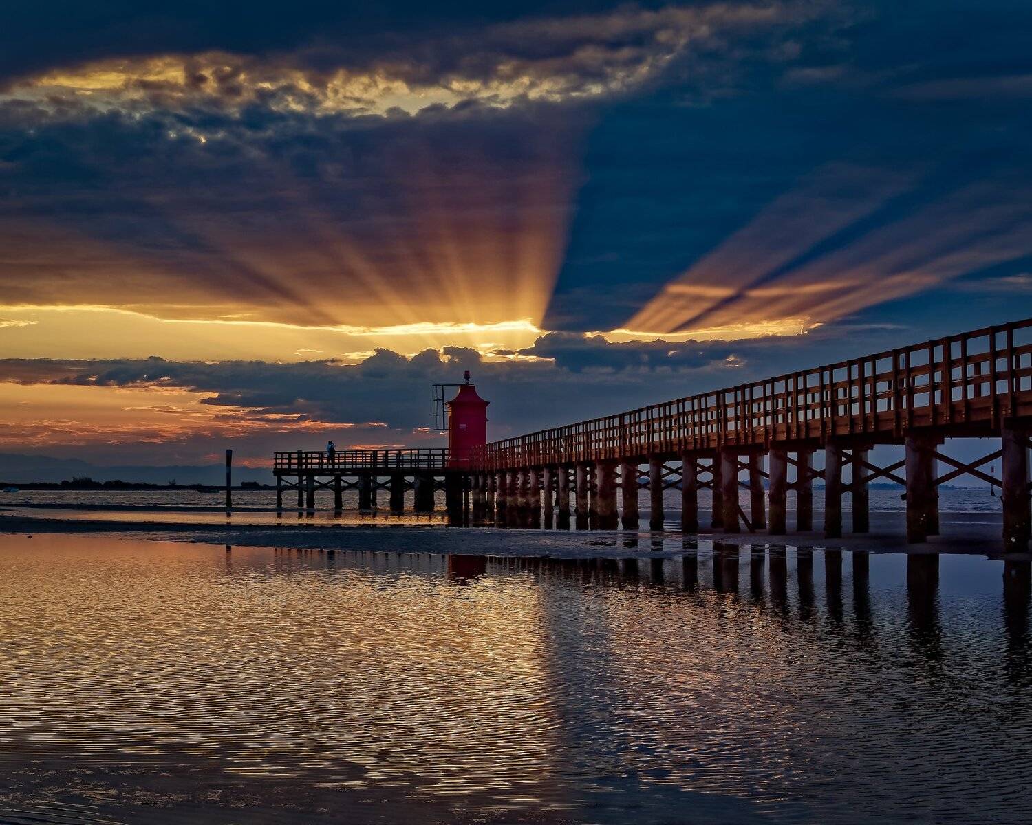 Sunrise at lighthouse, Italy