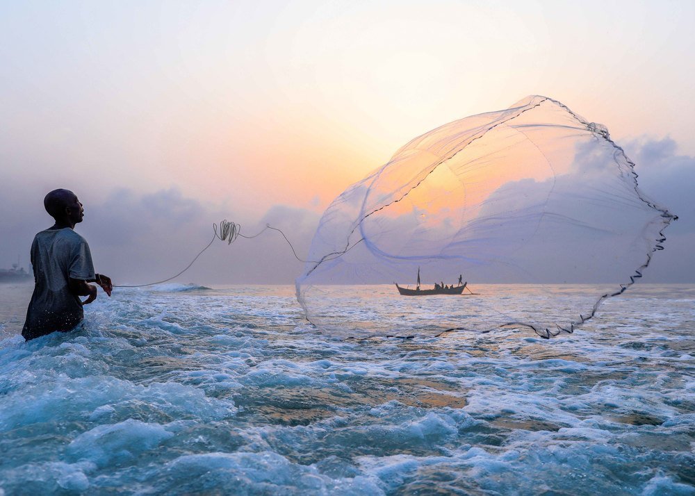 Cast net in sea