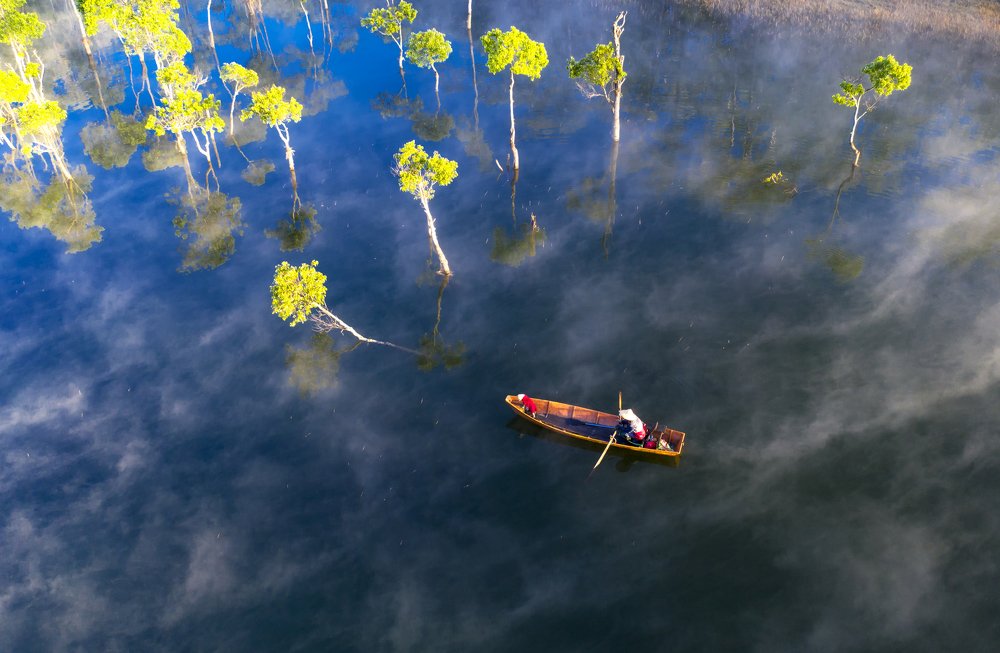 The old man in the early foggy morning
