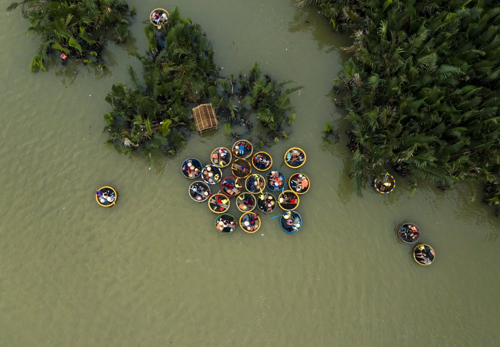 Visiting water Coconut field on rounded boats.