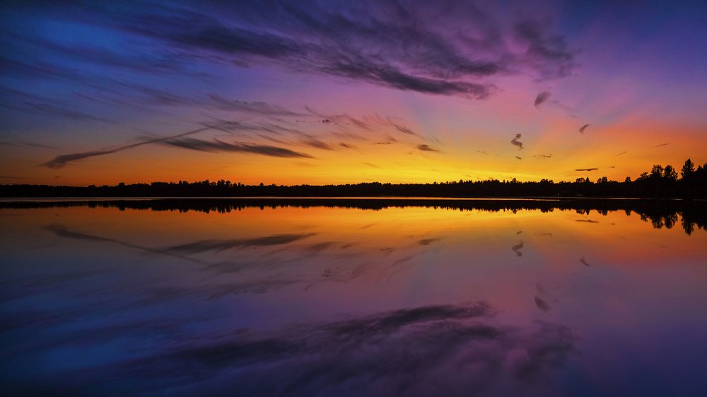 Закат на озере Долотцо