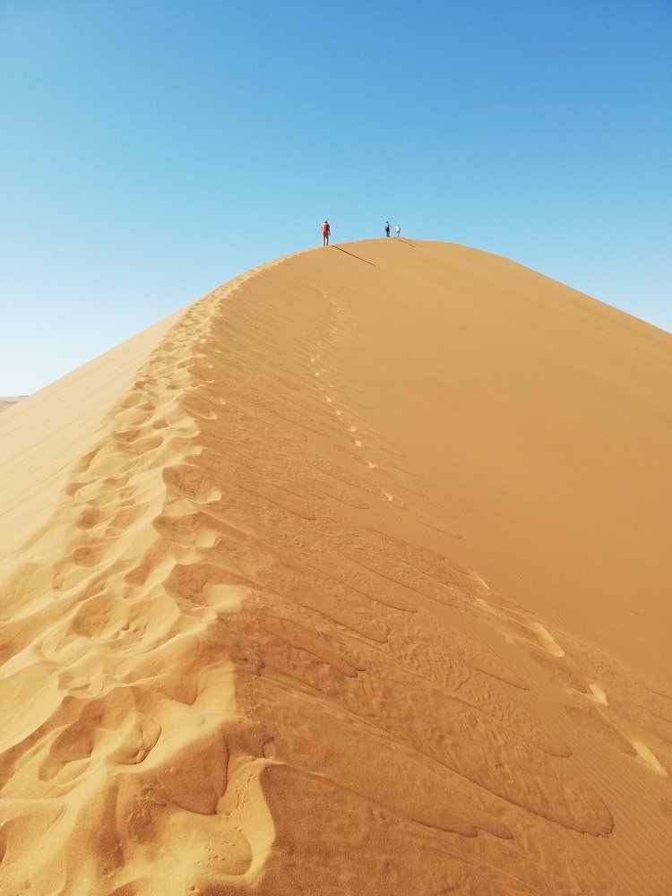 Climbing Dune 45, Namibia