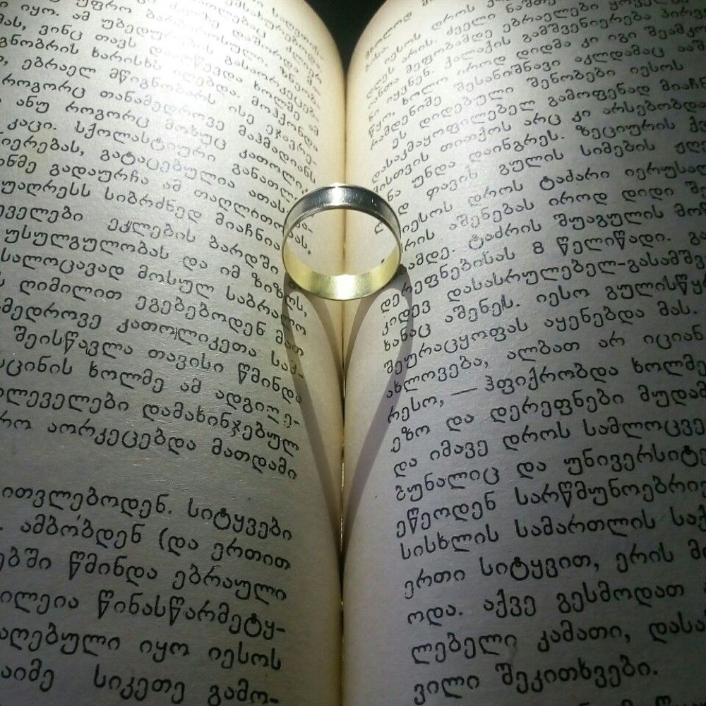 Ring on the book