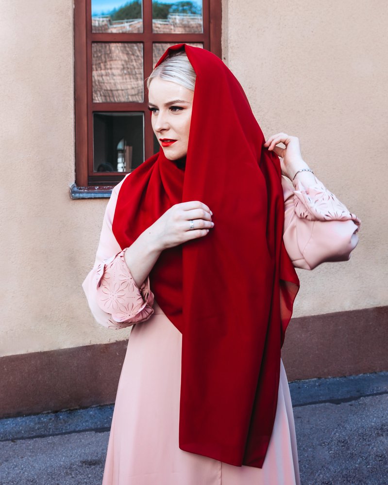 Woman with red scarf