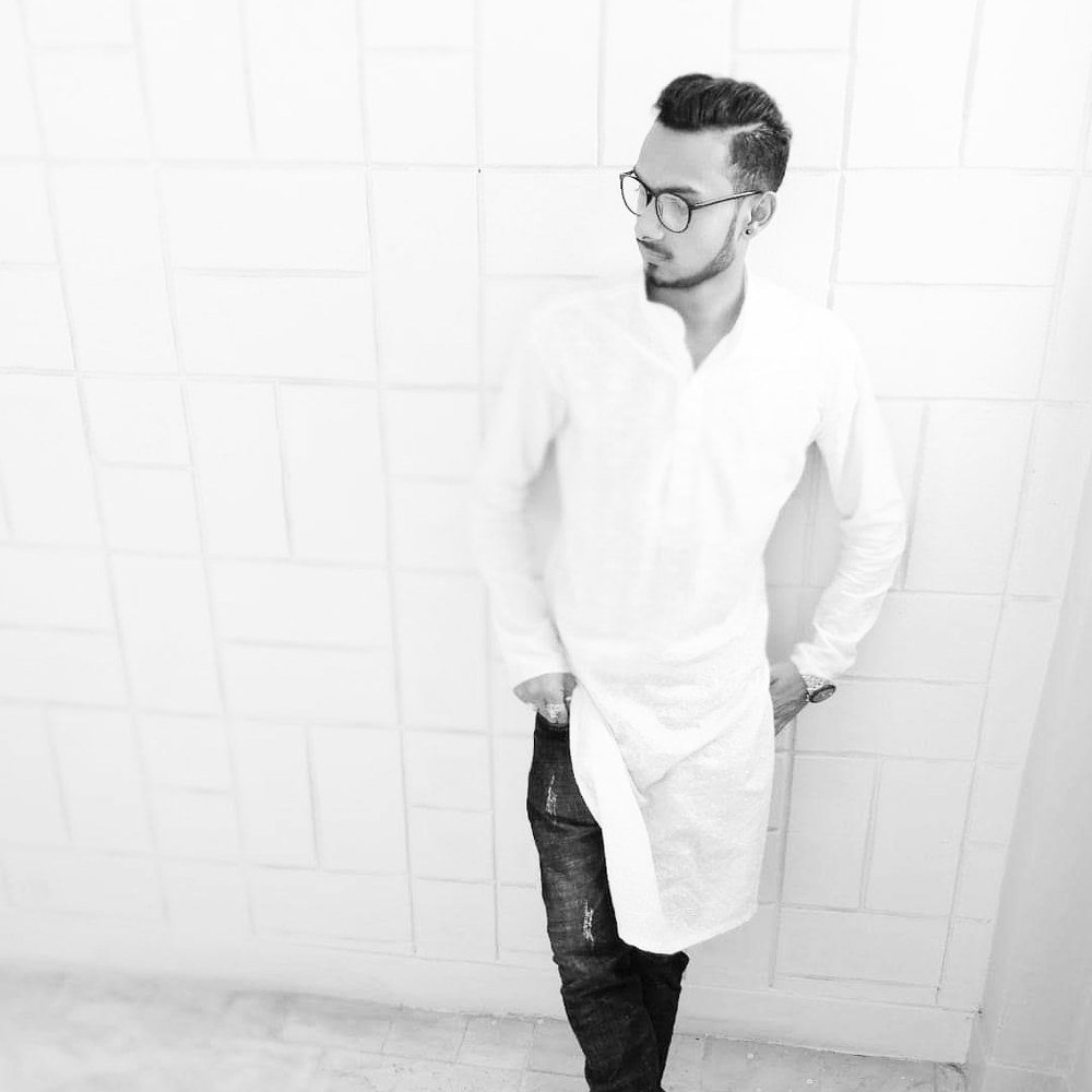 Person With White Kurtha & Jeans