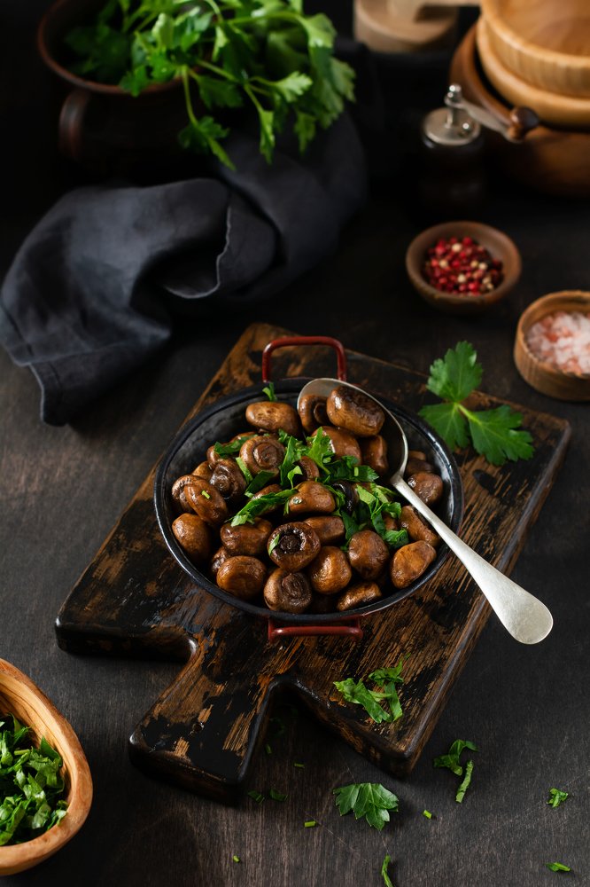 Mushrooms champignon fried in soy sauce.