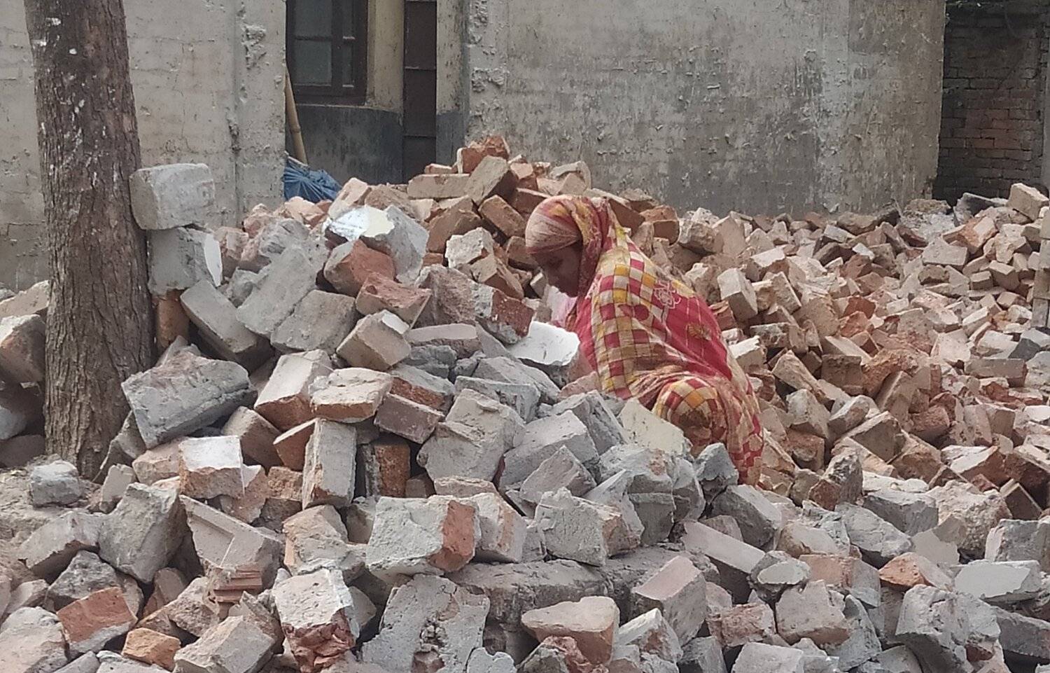 Brick-breaking worker