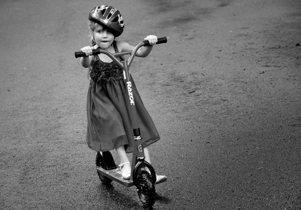 Girl on a scooter