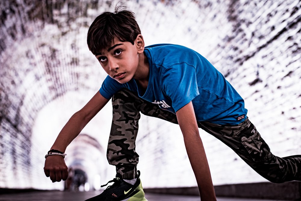 A son in a light tunnel