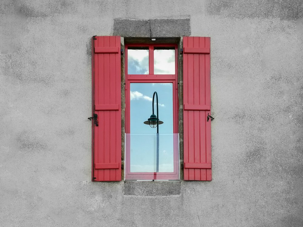 Window with red shutters