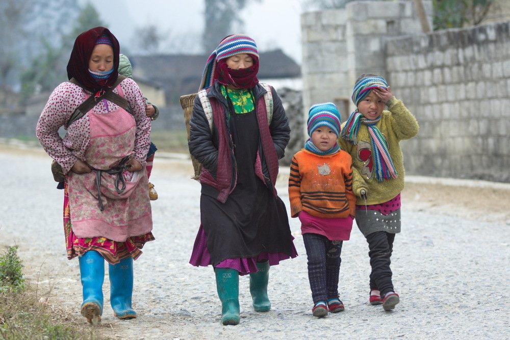 family going to traditional market