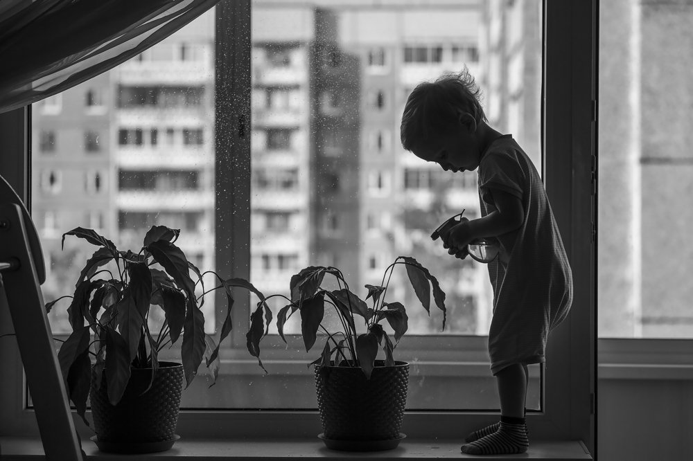 На поливке цветов.