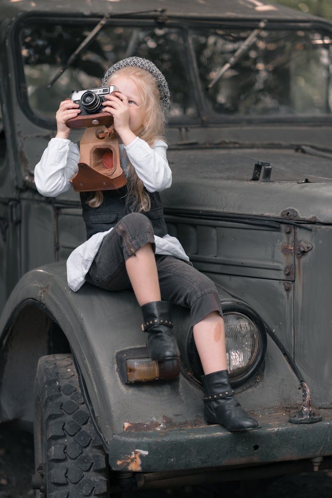 Девочка с фотоаппаратом