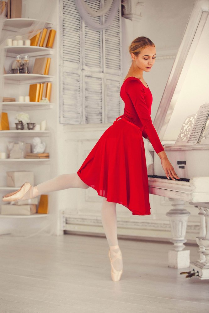 Ballerina playing on the piano